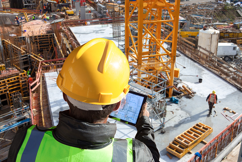 top view of construction site with multinational worker